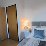 In Lejlighed